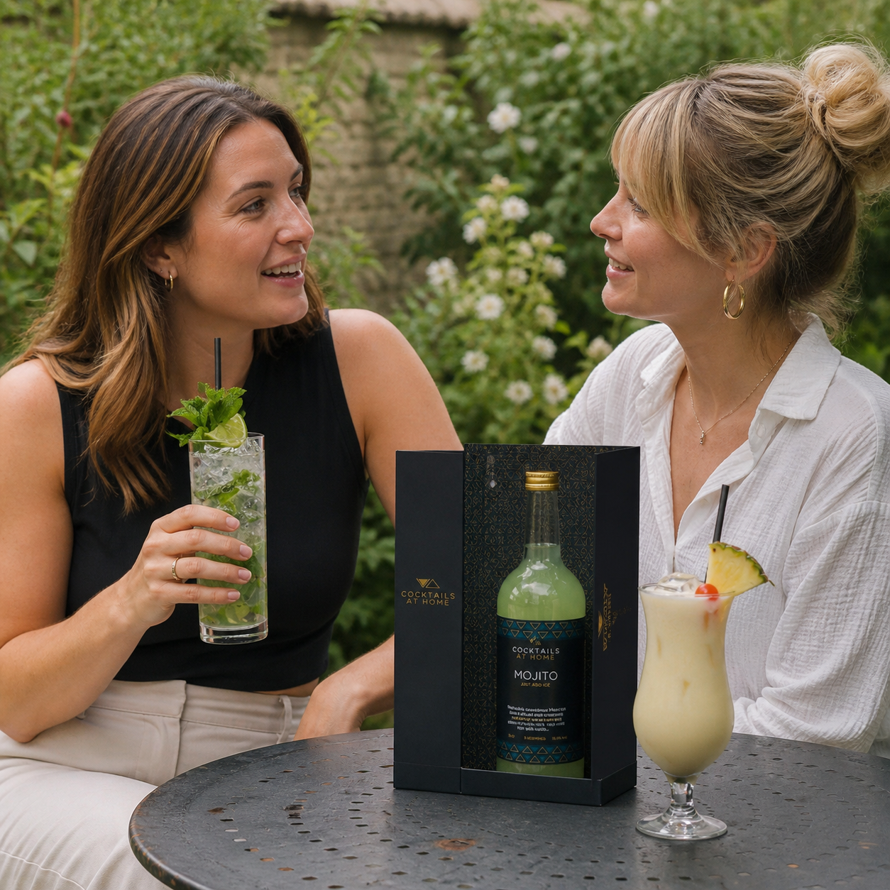 Two friends enjoying cocktails together in a garden