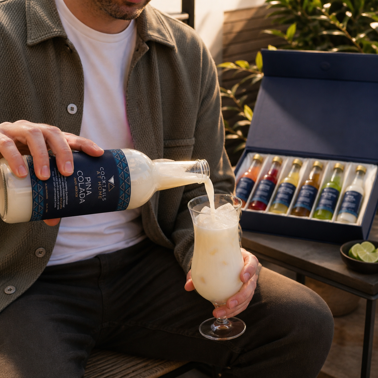 Piña Colada being poured over ice on a garden patio